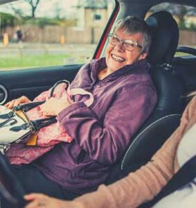 Elderly Women in Car
