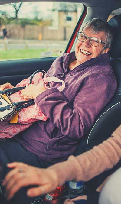 Elderly Women in Car